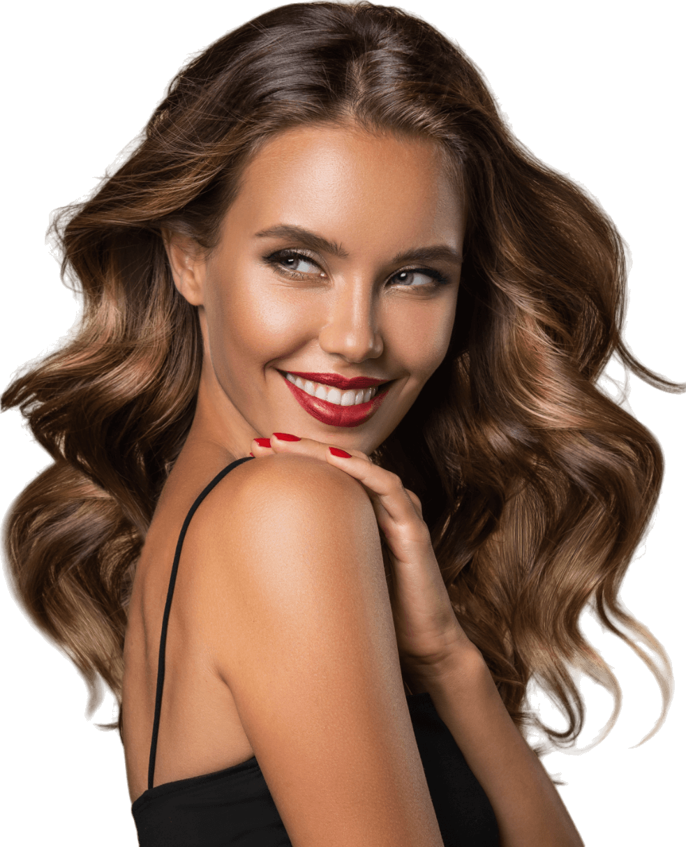 Brunette model with a tan and red lipstick, smiling but looking away from the camera